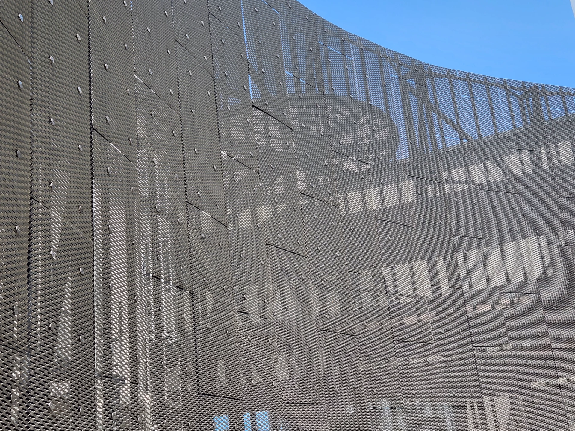 Acoustic Performance and Noise Reduction with Architectural Expanded Mesh Panels